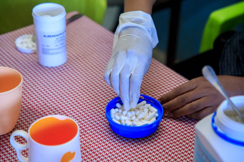 Praziquantel and albendazole, medicines used to treat people affected by parasitic worm infections.